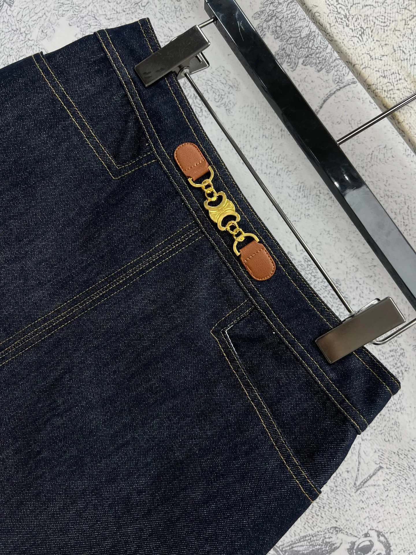 Hardware decorated denim short skirt