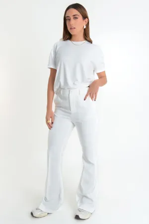 Pantalón ajustado flare fit con raya