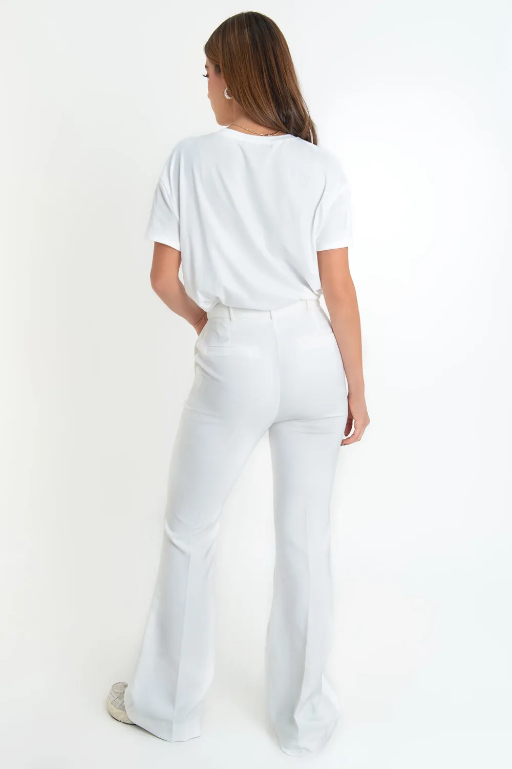 Pantalón ajustado flare fit con raya