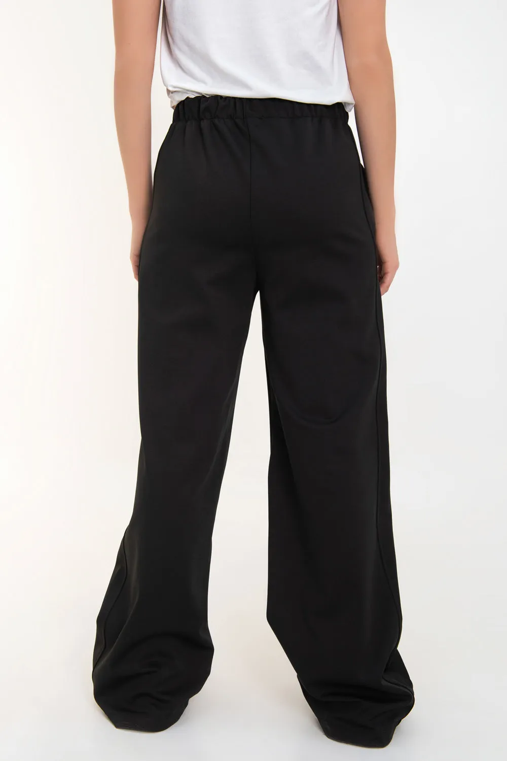 Pantalón fluido fit flare con raya