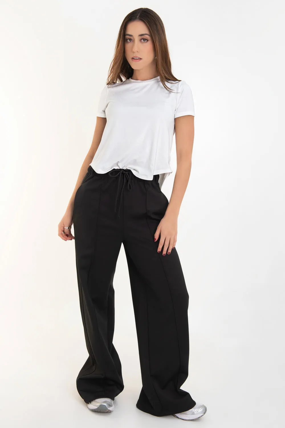 Pantalón fluido fit flare con raya