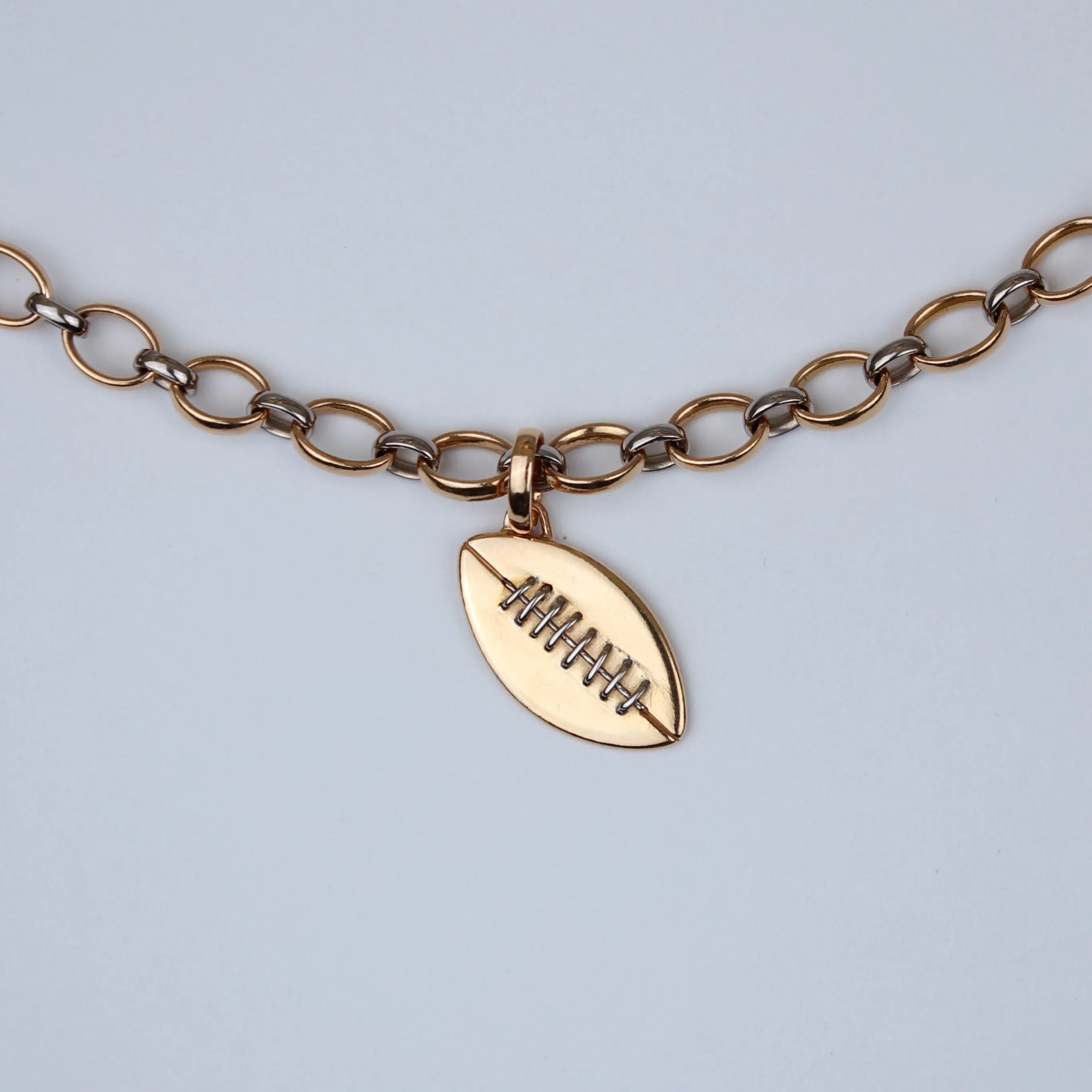Sonoma Football Pendant in 22K Apricot Gold and 18K Alpine Gold