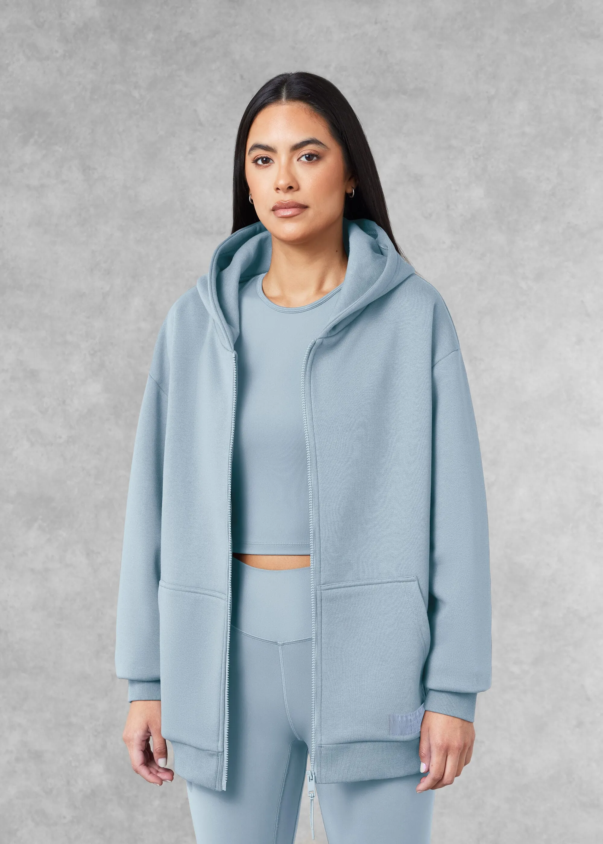 THE GIVING MOVEMENT COTTON OVERSIZED ZIP HOODIE