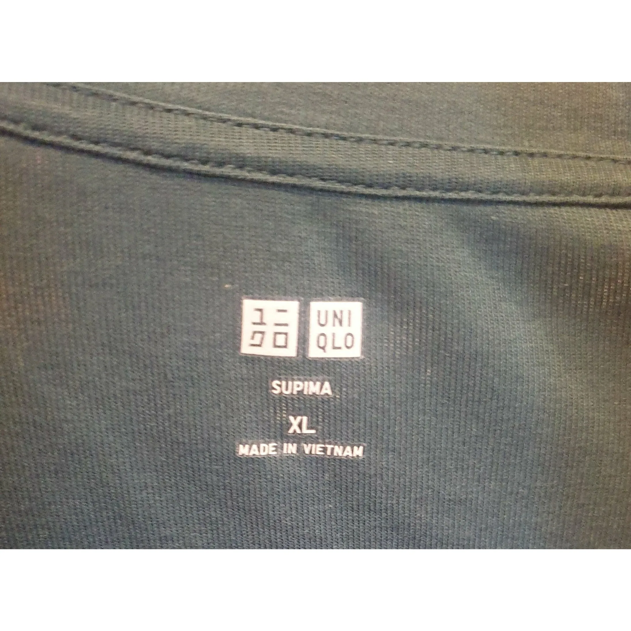 Uniqlo green long sleeve top size XL (best fits 14)