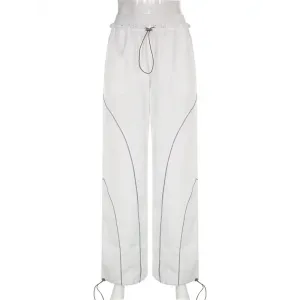 White sports Y2K pants with reflective stripes